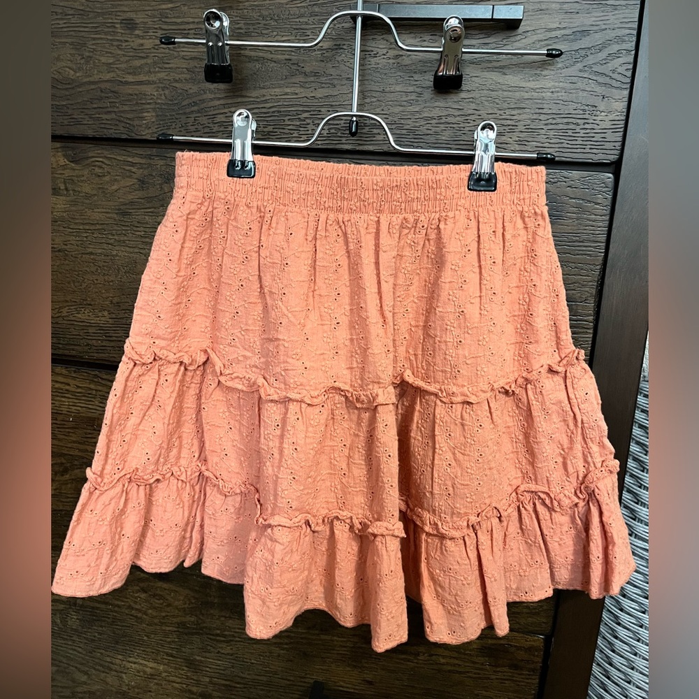Peach colored eyelet patterned skirt